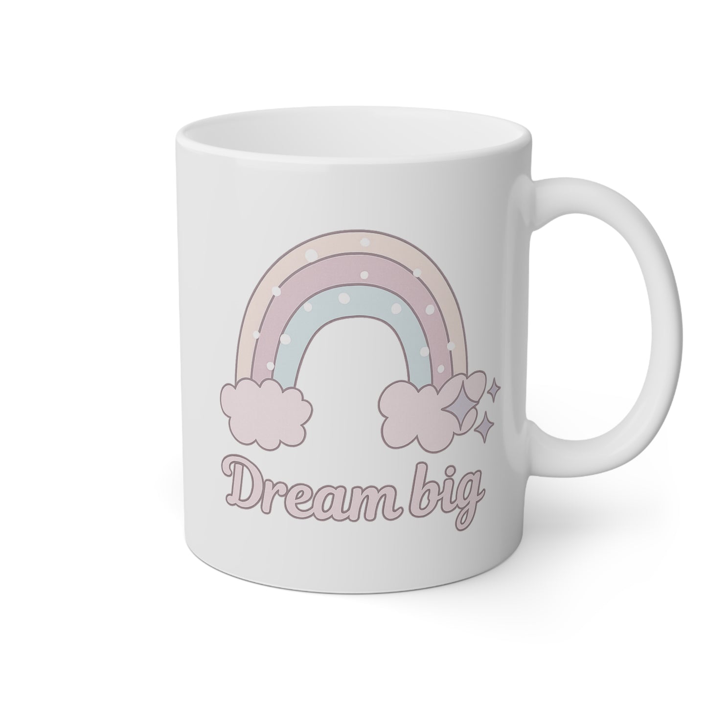 Taza blanca con un arcoíris y la frase Dream big