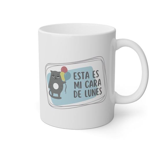 Taza blanca con un gato y la frase esta es mi cara de lunes